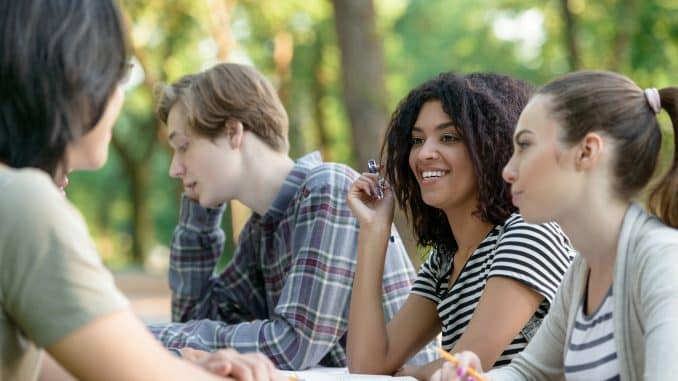 Multiethnic group of happy young students